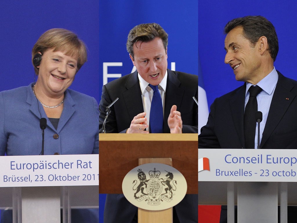 Left to right, German Chancellor Angela Merkel, David Cameron and President Nicolas Sarkozy at an EU summit in Brussels yesterday
