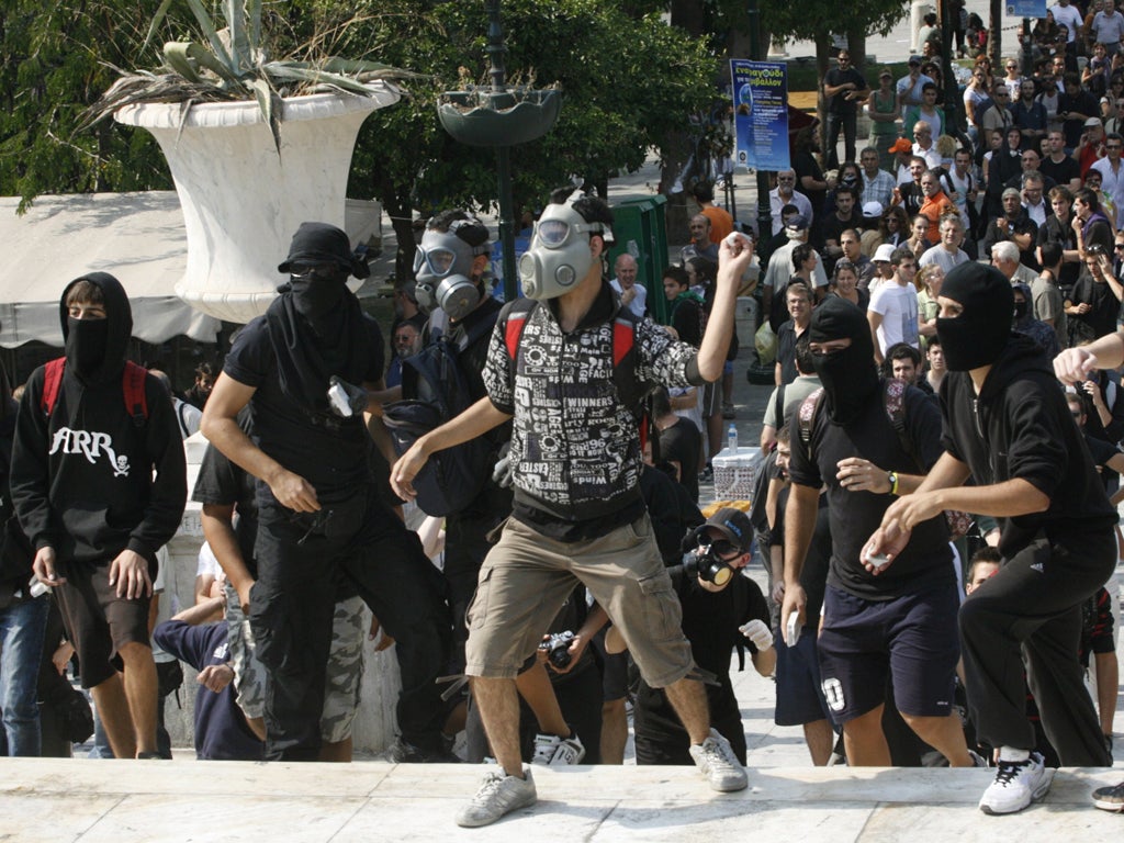 Protesters clash with police in Greece, heart of the crisisProtesters clash with police in Greece, heart of the crisis