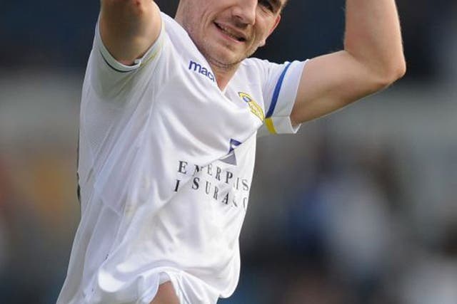 Leeds' Robert Snodgrass celebrates scoring against Cardiff yesterday 