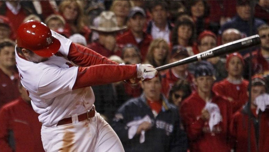 St Louis Cardinals' David Freese hits the winning home run in
the 11th innings of Game Six of the World Series to spark wild celebrations