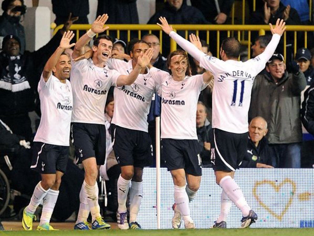 Spurs' players celebrate another sublime goal against QPR on Sunday