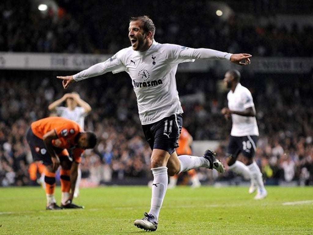 Tottenham Hotspur's Rafael van der Vaart celebrates after scoring against QPR