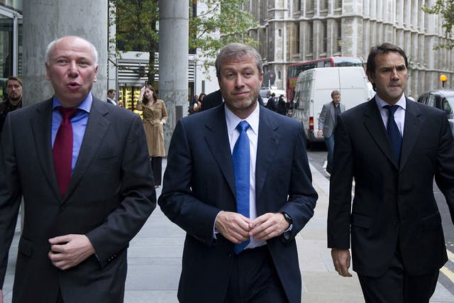 Roman Abramovich arrives at court yesterday with David Davidovich