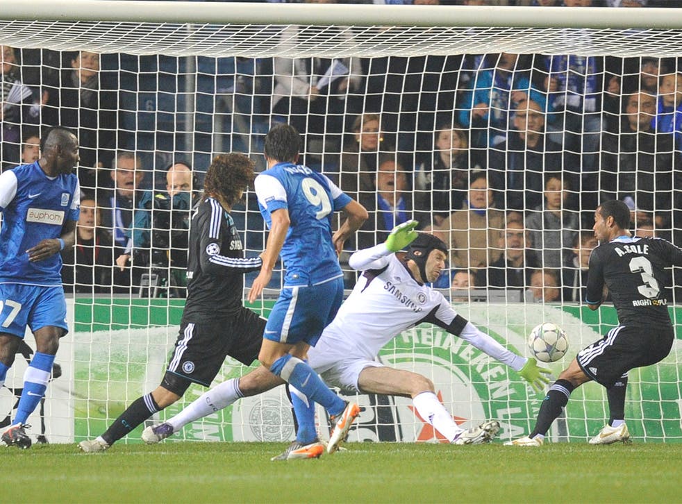 Genk's Jelle Vossen escapes David Luiz to score past Chelsea keeper Petr Cech last night