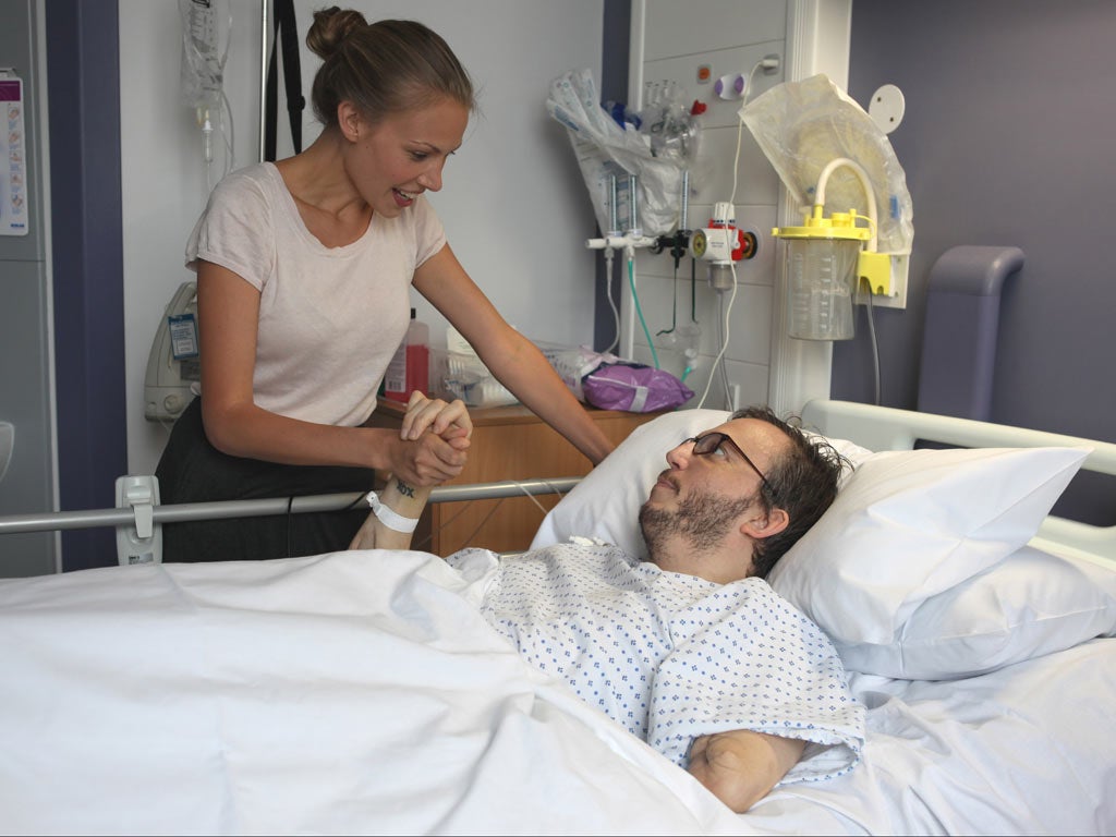 A man apart: Giles Duley with his girlfriend Jennie in hospital