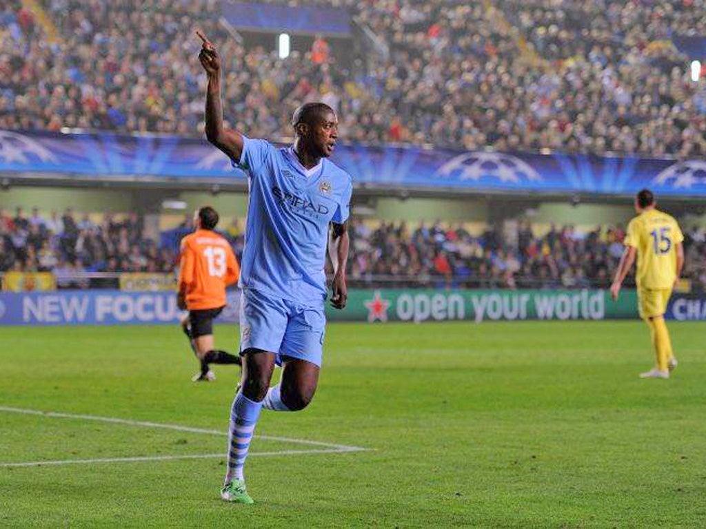 Yaya Toure celebrates his second goal of the night