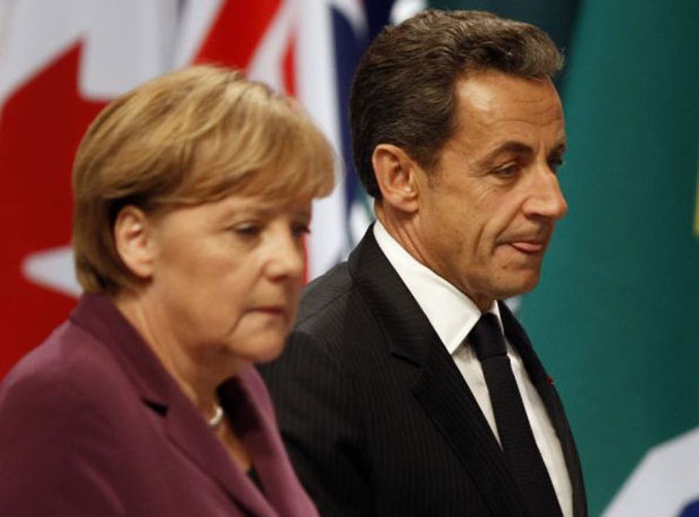 Angela Merkel and Nicolas Sarkozy warned Greece that other eurozone countries would rather pull the plug on it than face months of market uncertainty