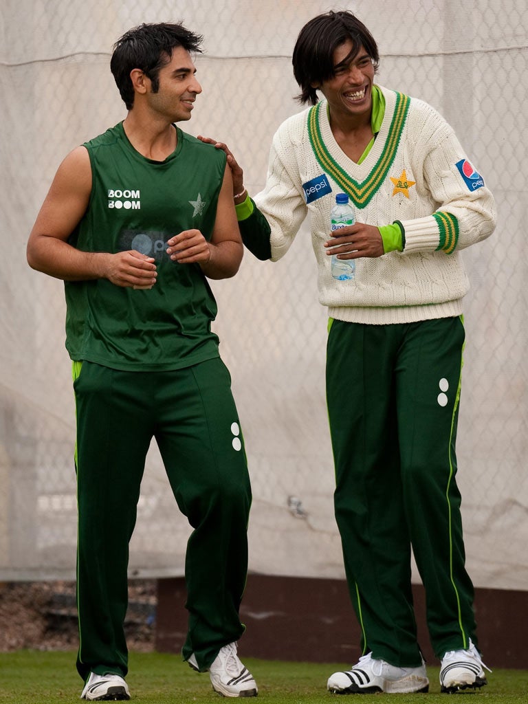 Amir and Butt are all smiles at a nets session in England last
summer