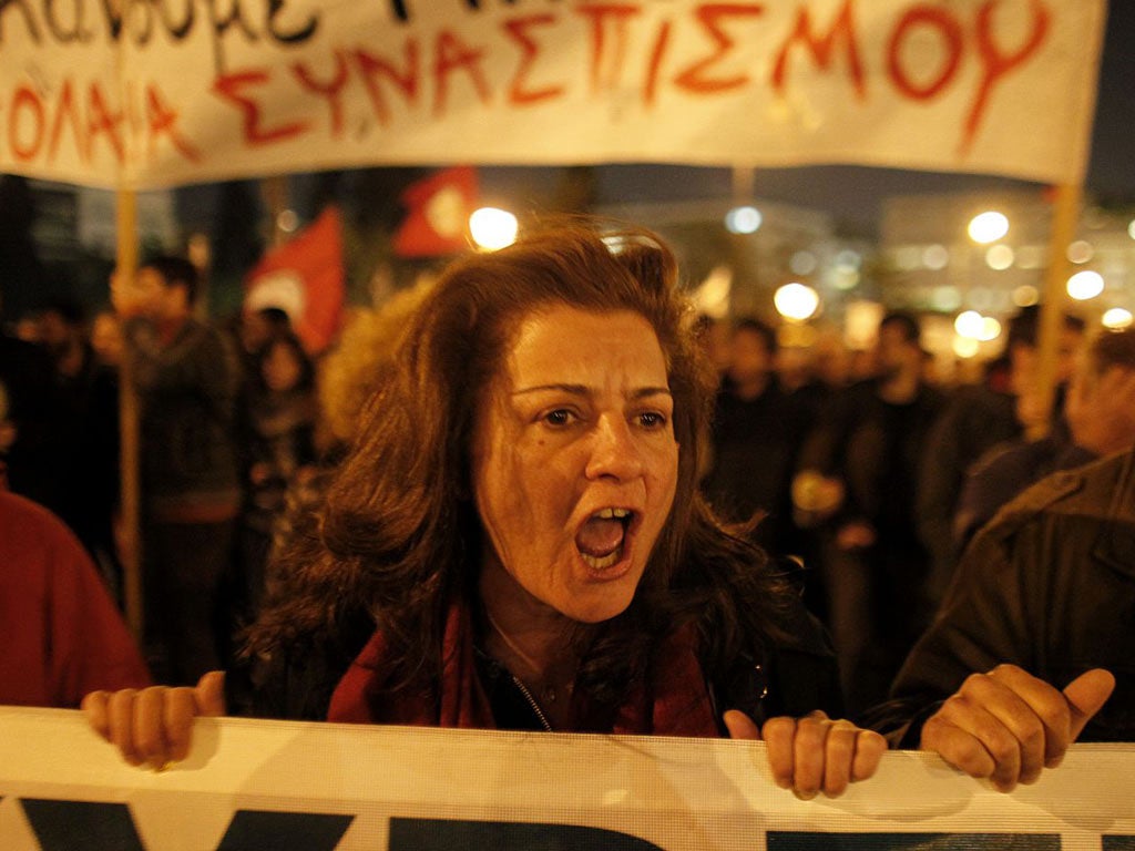 Protesters chant slogans at an anti-austerity rally in Athens