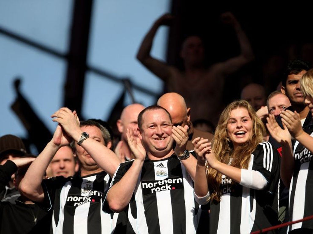 Mike Ashley mixes with the Newcastle fans - with not a pint in sight