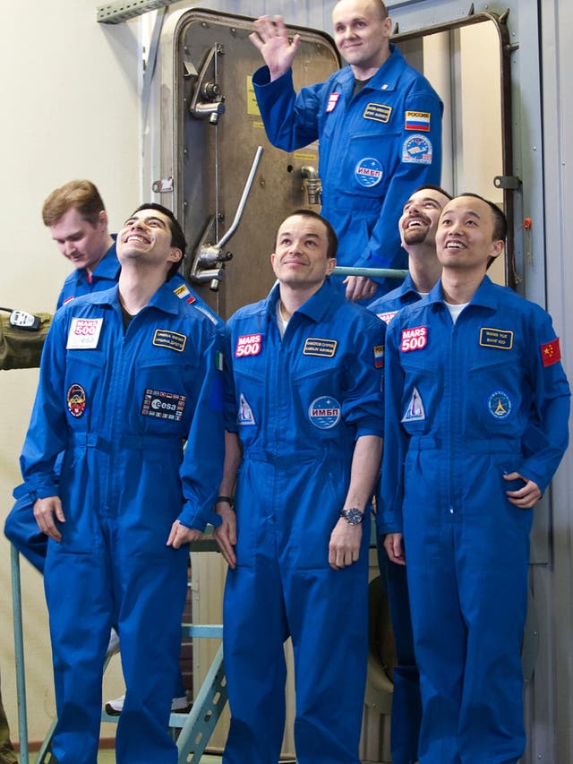 The Mars500 crew leaving their 'space ship' yesterday