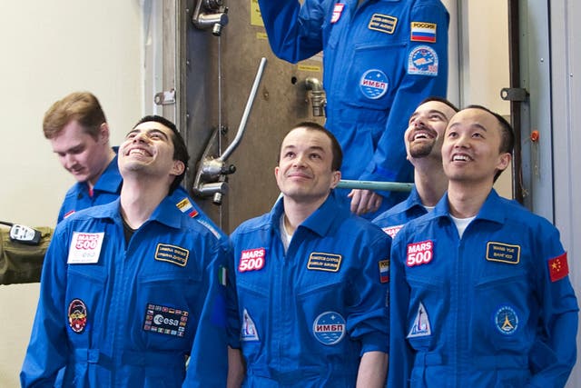 The Mars500 crew leaving their 'space ship' yesterday