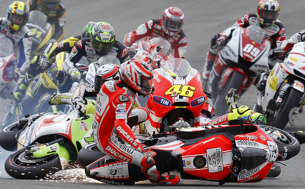 The crash on the first corner in Valencia after riders had paid tribute to Marco Simoncelli