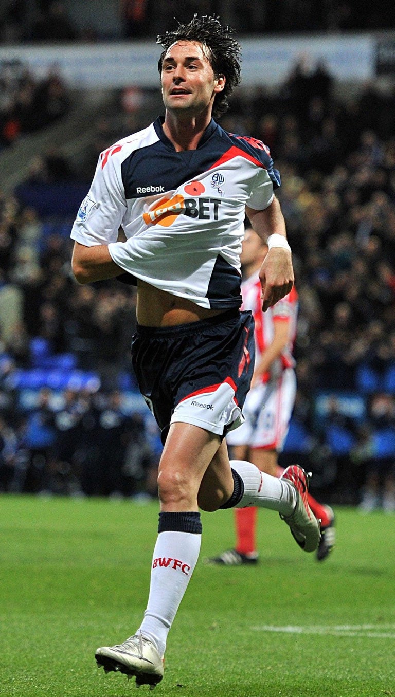 Chris Eagles celebrates a personal double and Bolton's fourth goal