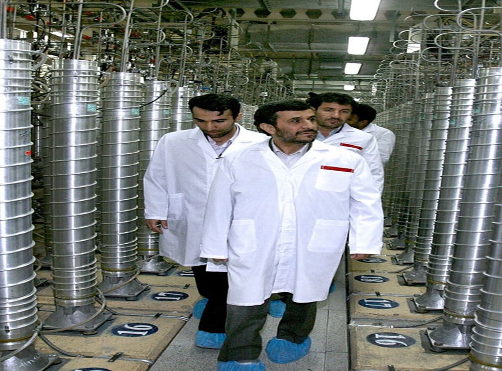 The Iranian President Mahmoud Ahmadinejad visits a uranium
enrichment plant near Tehran