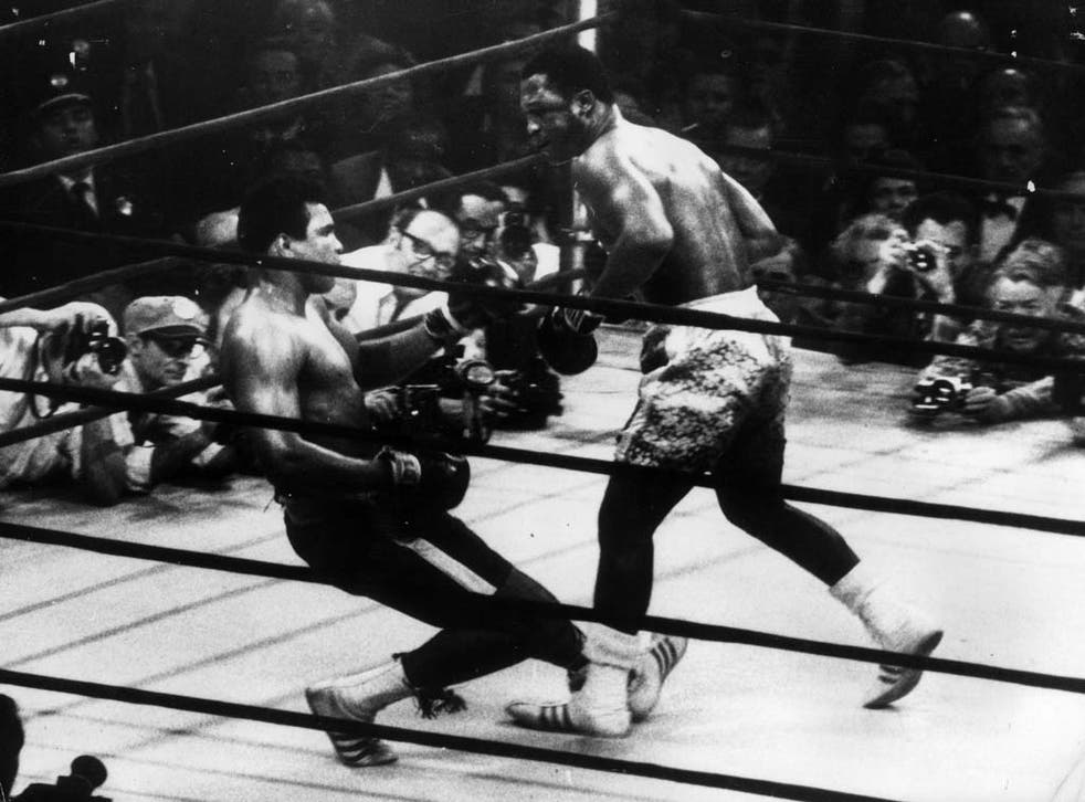 MARCH 1971 v MUHAMMAD ALI: Frazier emerged victorious from a showdown billed 'Fight of the Century'.