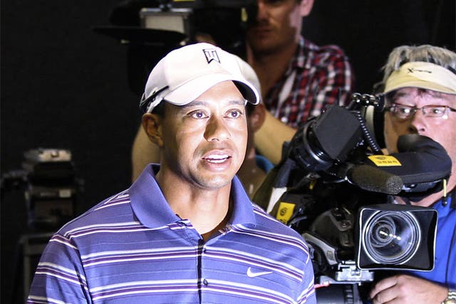 Tiger Woods says his former caddie 'is not a racist'