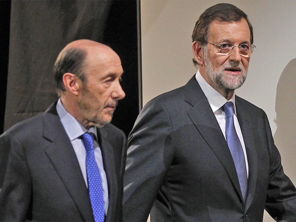 Alfredo Perez Rubalcaba, left, and Mariano Rajoy arrive for the debate