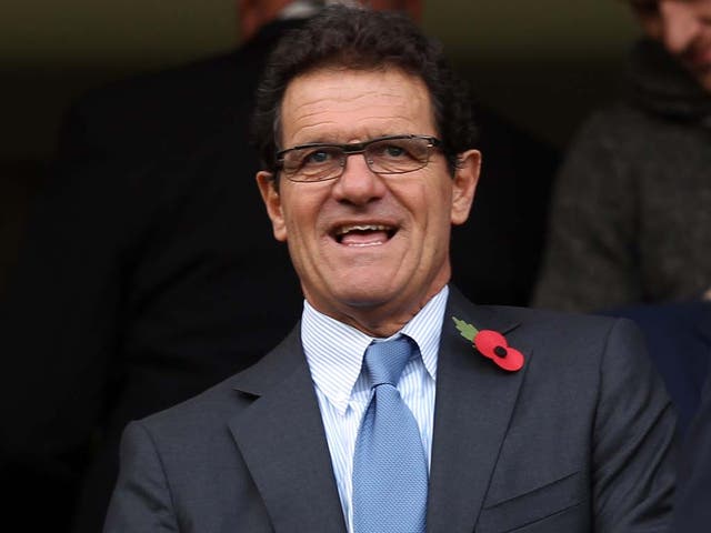 England manager Fabio Capello pictured wearing a poppy