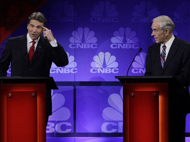 Rick Perry (left) and Ron Paul during the debate