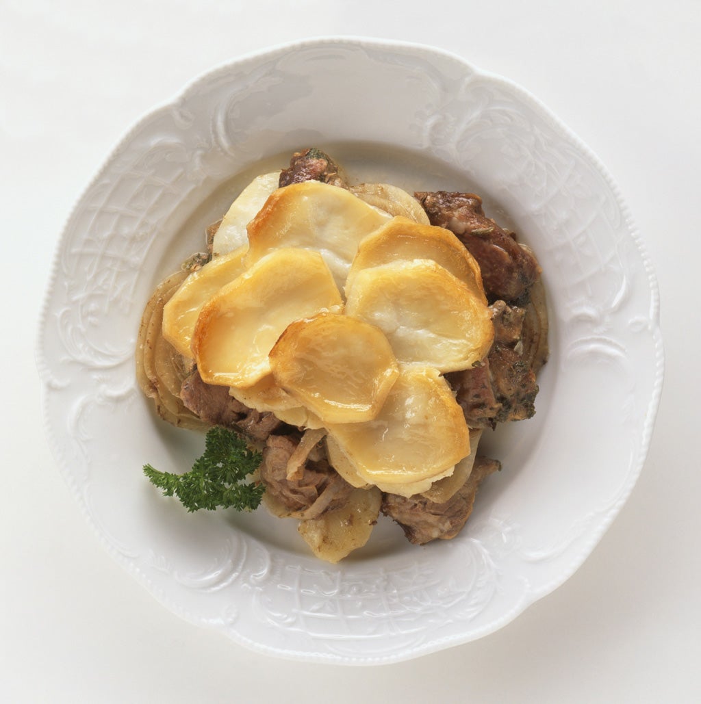 Irish stew topped with potatoes
