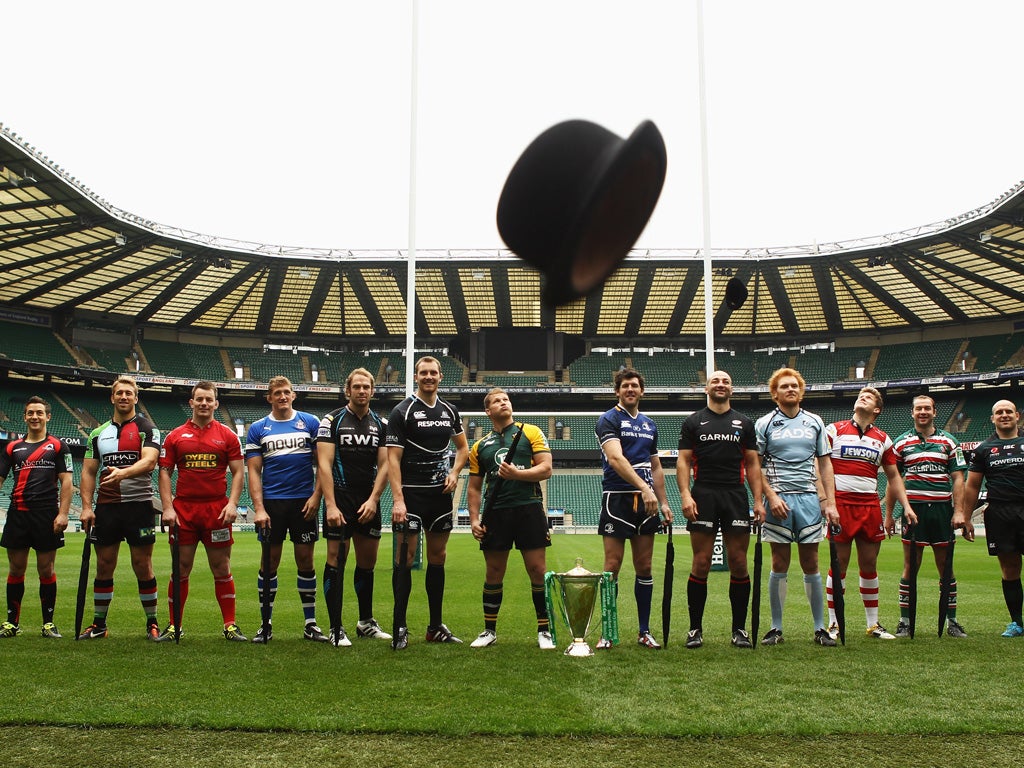 The Heineken Cup captains look on as the obligatory bowler hat is flung at the Heineken Cup launch at Twickenham