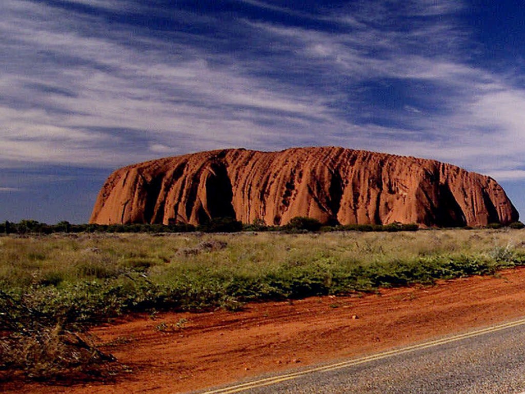 Uluru, Australia: Otherwise known as Ayers Rock, the 348m-high sandstone formation in central Australia is 9.4km in circumference and is a natural wonder particularly sacred to aboriginals