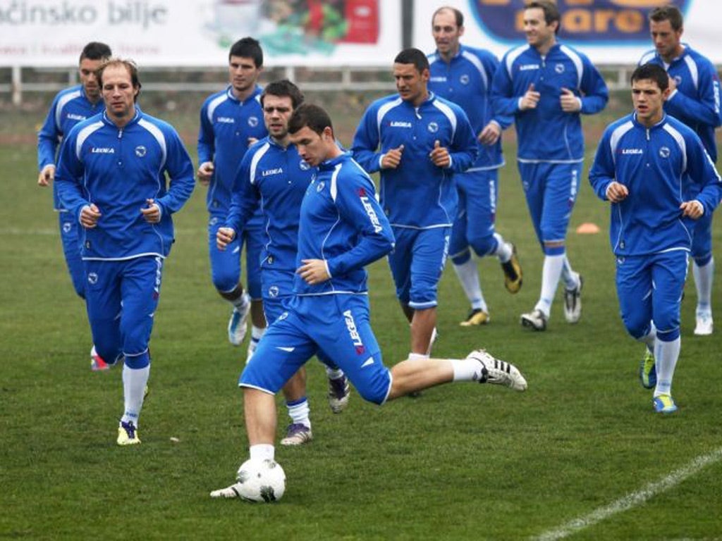 Bosnia's Edin Dzeko in a training session with his teammates