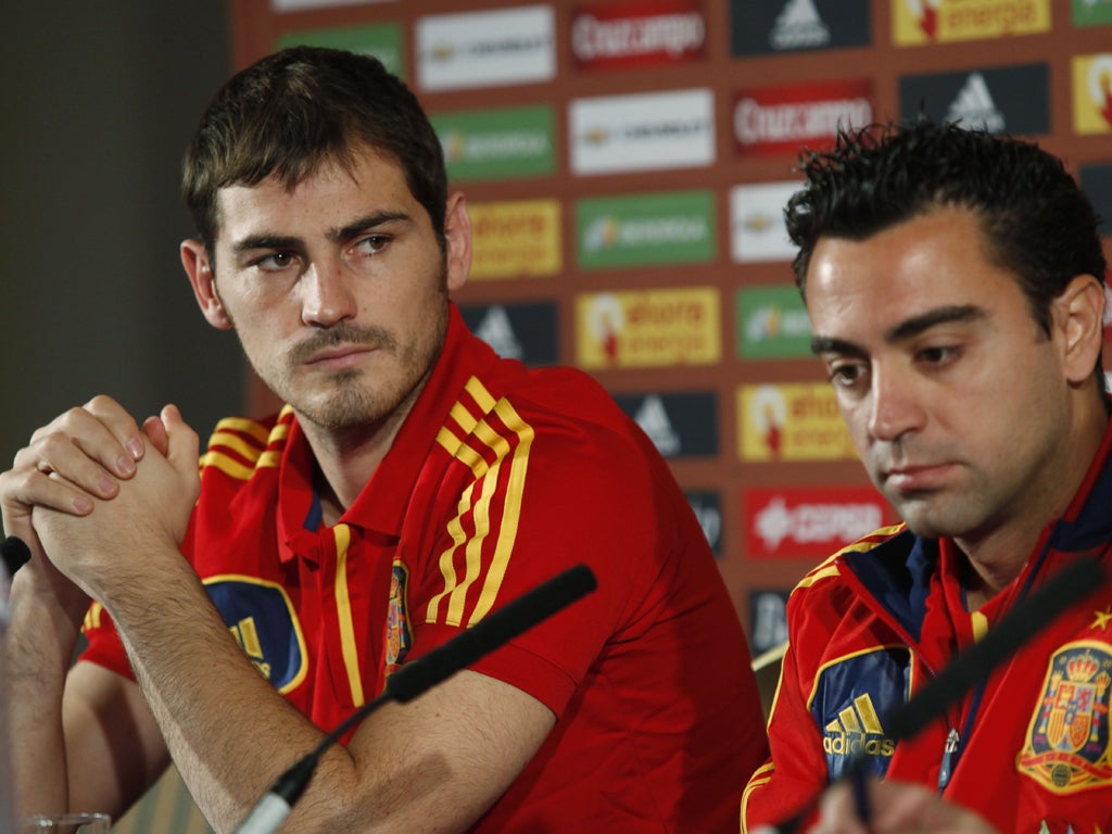 Spain's Iker Casillas (left) and Xavi are both hungry for more success