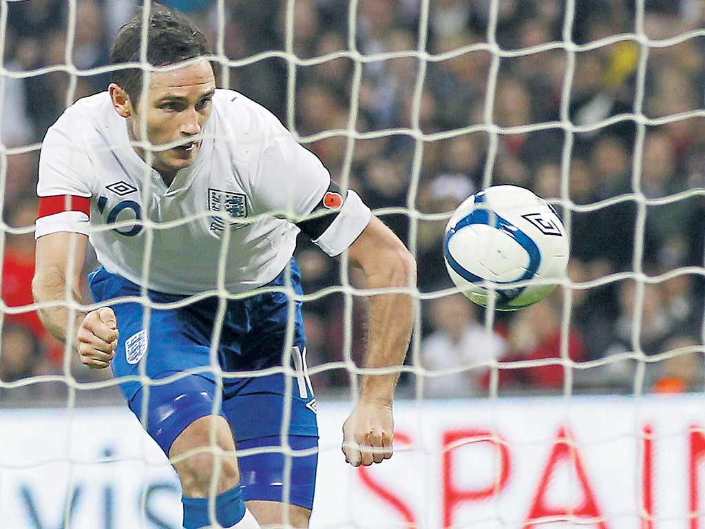 Frank Lampard nods the ball into an empty net to give England an unexpected 1-0 win over Spain at Wembley yesterday