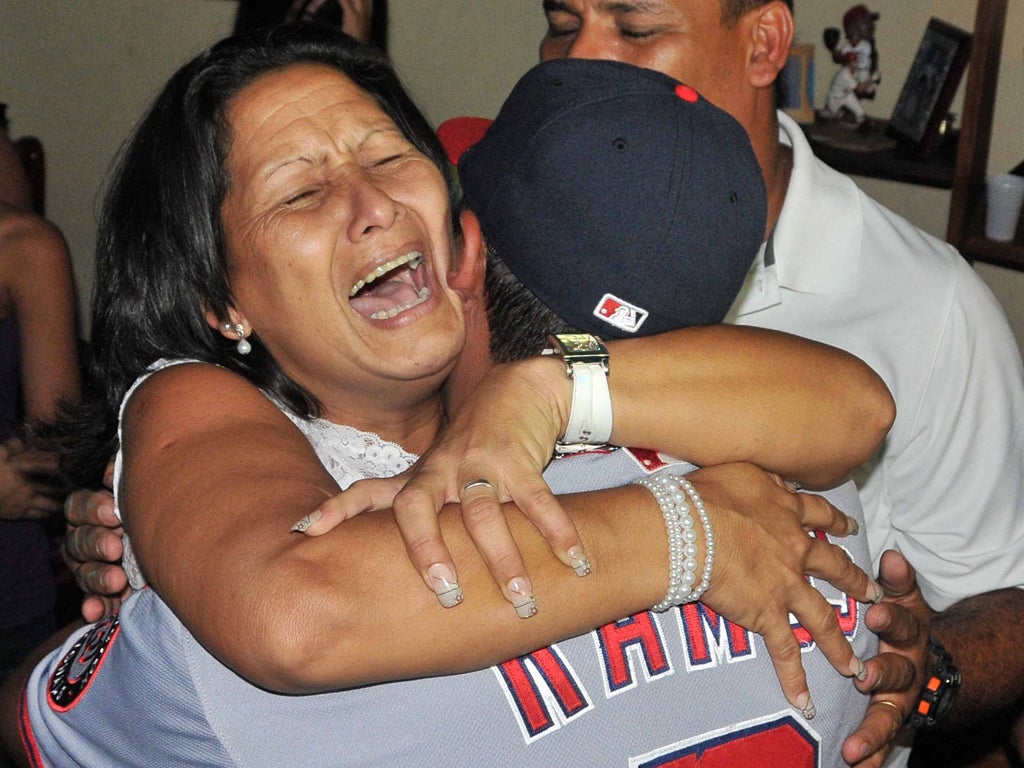 Wilson Ramos being greeted by his mother after his rescue