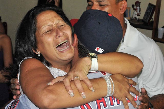 Wilson Ramos being greeted by his mother after his rescue