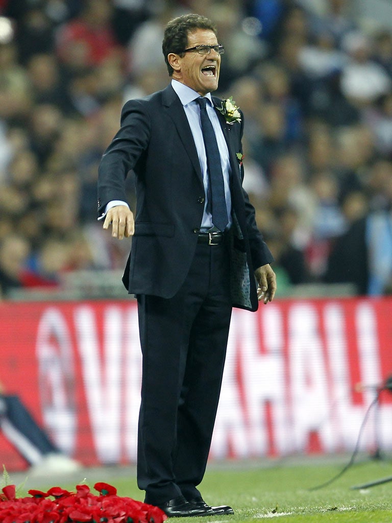 Fabio Capello urges his team on during their victory over Spain