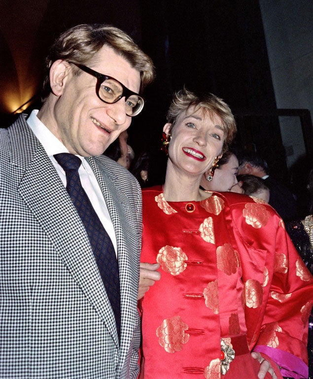 De la Falaise with Yves Saint Laurent at a reception in 1991