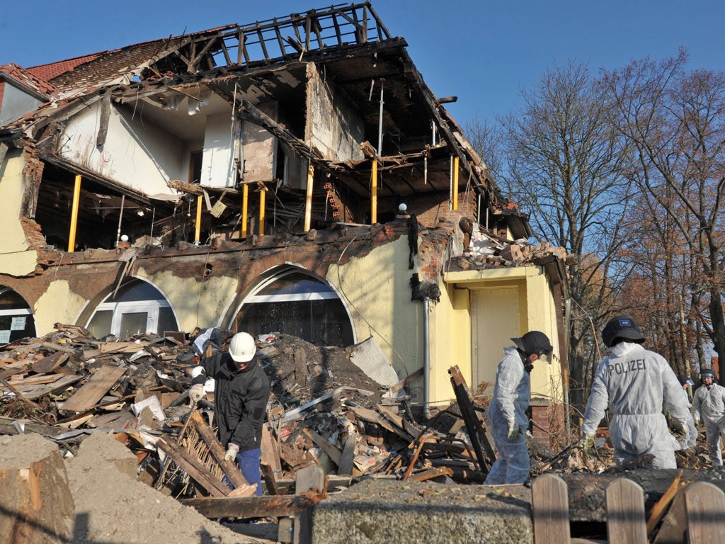 Police search the burnt-out house of Beate Zschäpe in Zwickau last week