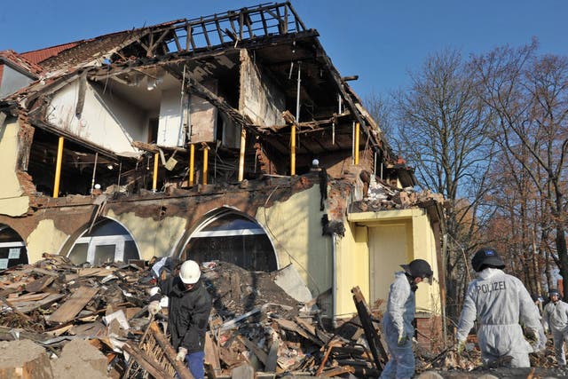Police search the burnt-out house of Beate Zschäpe in Zwickau last week