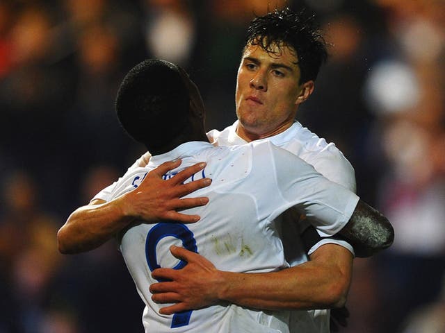 Martin Kelly (right) opened the scoring for England