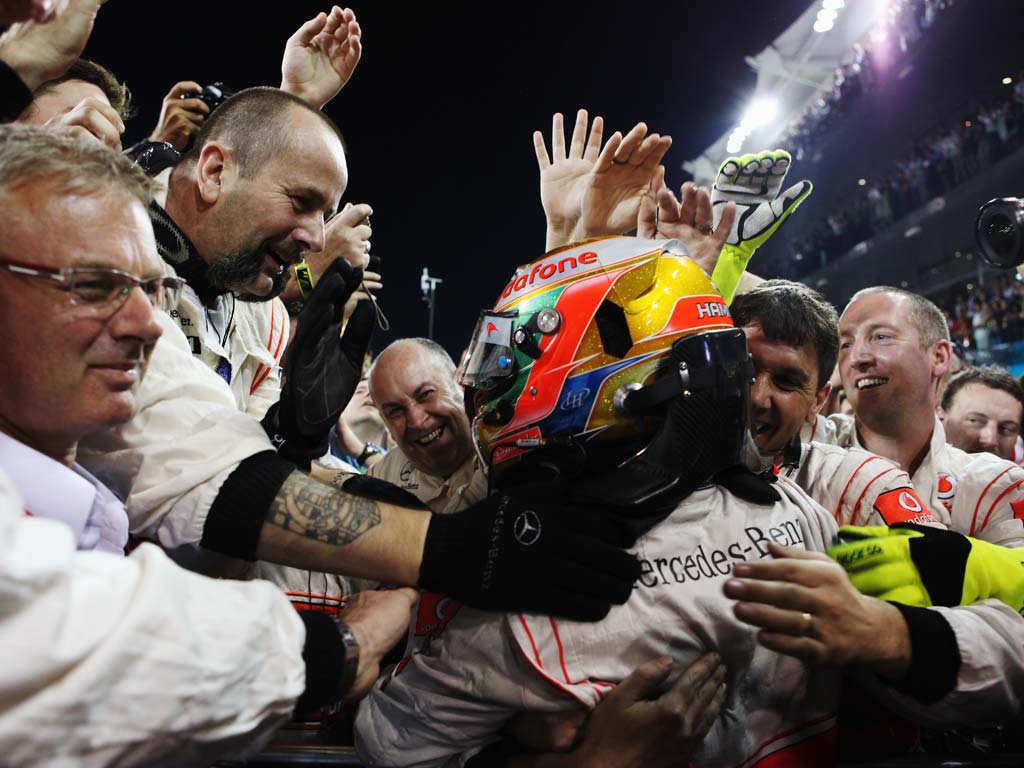 Lewis Hamilton celebrates in Abu Dhabi