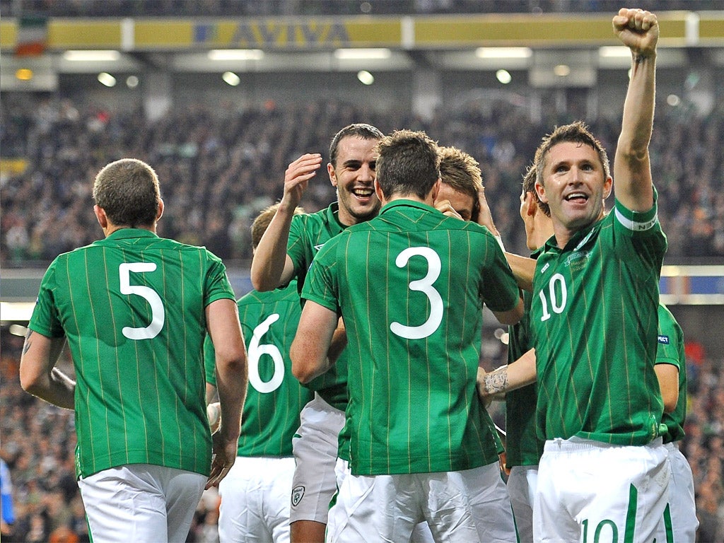 Robbie Keane leads the Irish celebrations