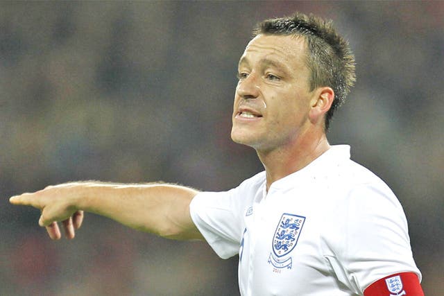 Captain John Terry directs his team-mates at Wembley last night