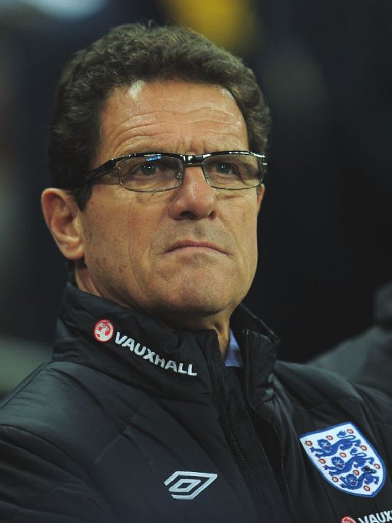 Fabio Capello said Phil Jones has the talent to play either
in midfield or defence