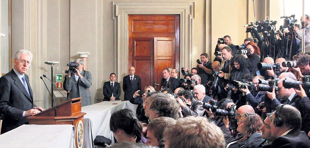 Italy's PM Mario Monti reveals his cabinet in Rome yesterday