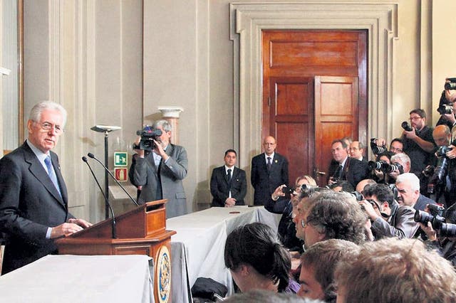 Italy's PM Mario Monti reveals his cabinet in Rome yesterday 