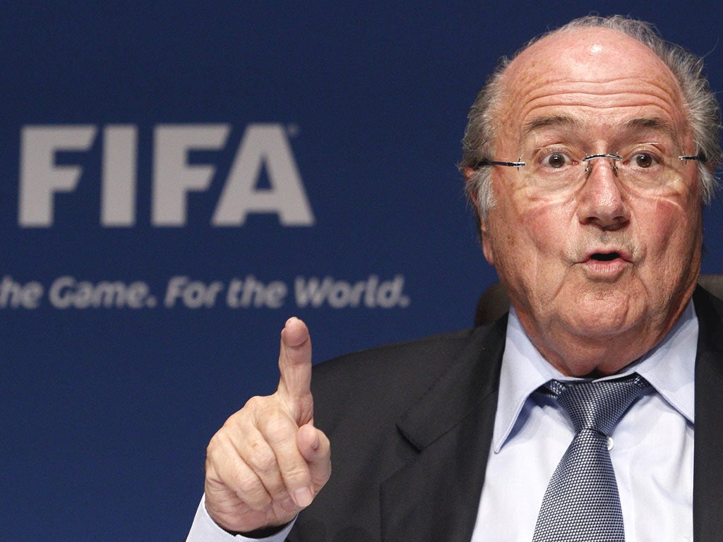 Fifa president Sepp Blatter says what little racism occurs
can be solved by a handshake