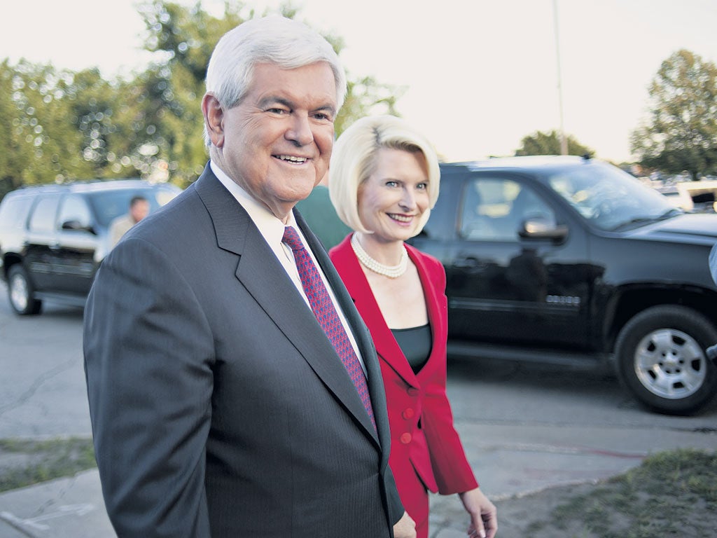 Republican presidential hopeful Newt Gingrich and his wife, Callista, on the campaign trail in Iowa