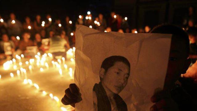 A vigil was held last month at a Tibetan refugee centre in Lalitpur, India, for Lobsang Phuntsok, a 21-year-old Tibetan monk who set himself alight in protest against Chinese repression