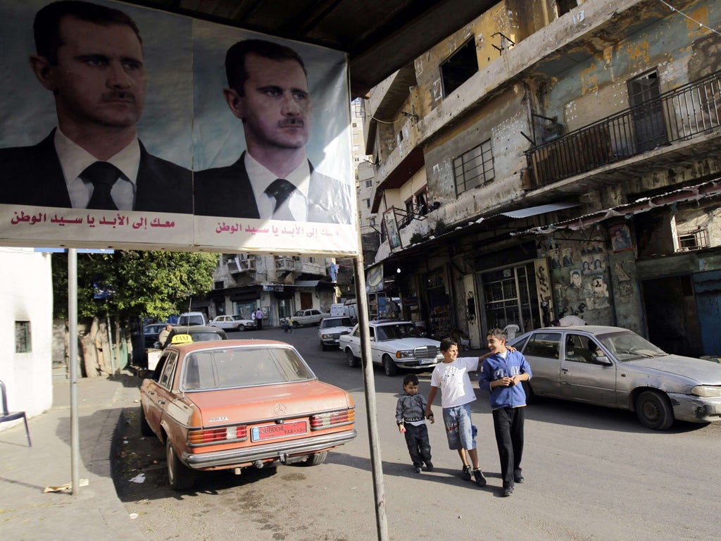 A poster of Syria's President Assad in northern Lebanon, where many people from the same Shia sect live