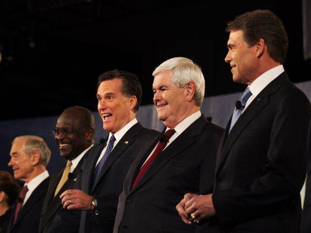 Republician presidential hopefuls, from L to R, Ron Paul, Herman Cain, Mitt Romney, Newt Gingrich and Rick Perry participate in the South Carolina Presidential Debate at Wofford College on 12 November