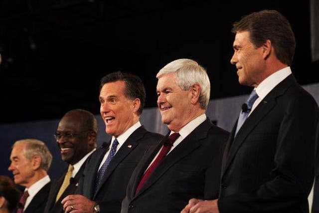 Republician presidential hopefuls, from L to R, Ron Paul, Herman Cain, Mitt Romney, Newt Gingrich and Rick Perry participate in the South Carolina Presidential Debate at Wofford College on 12 November