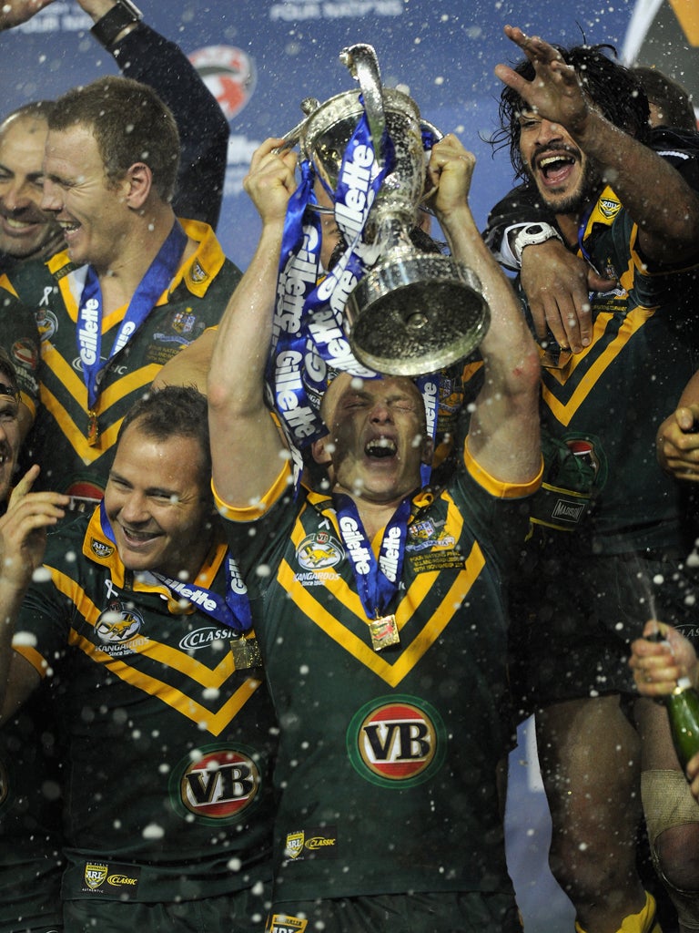 Australia captain Darren Lockyer lifts the Four Nations trophy after today's 30-8 win over England
